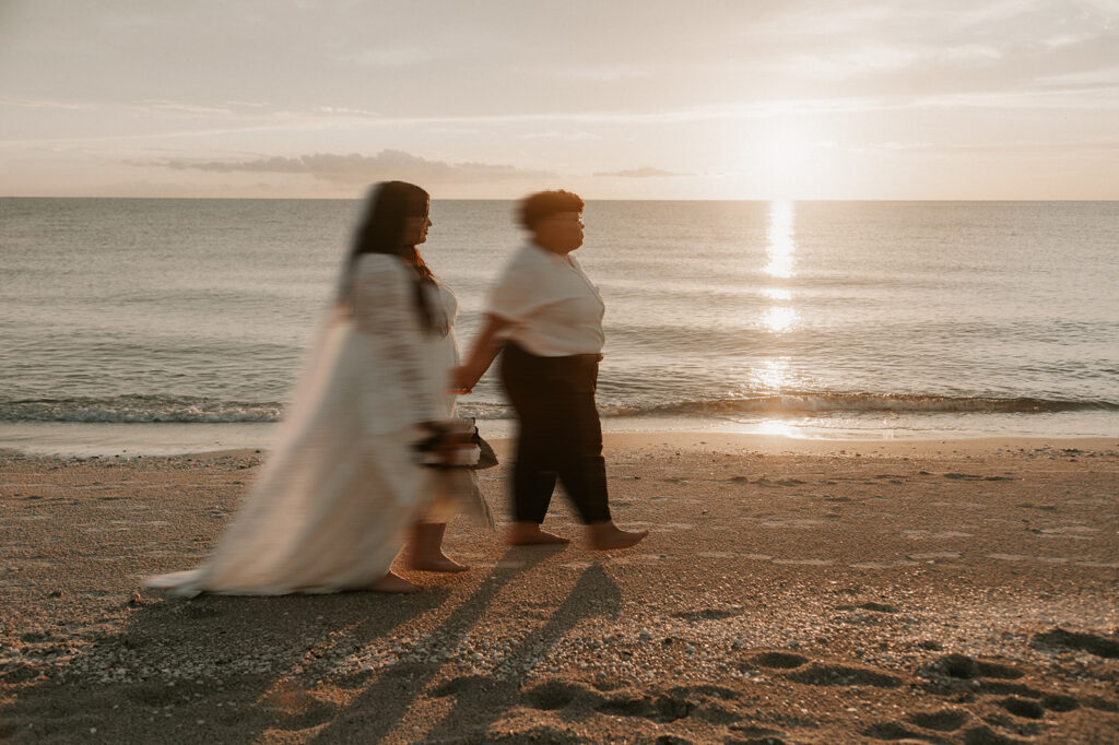 LGBTQ sunset beach elopement during fall on the east coast of Florida. 