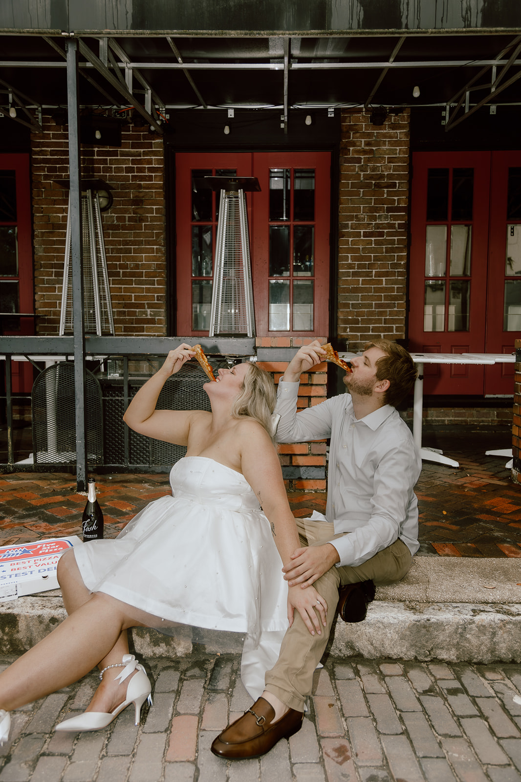 Kelsey and Jon enjoying five start pizza during their engagement session in Gainesville Florida