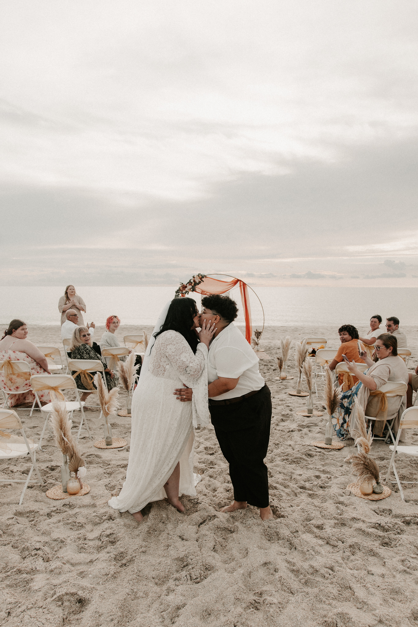 Leah and Olivia's intimate elopement ceremony on Nokomis Beach Florida