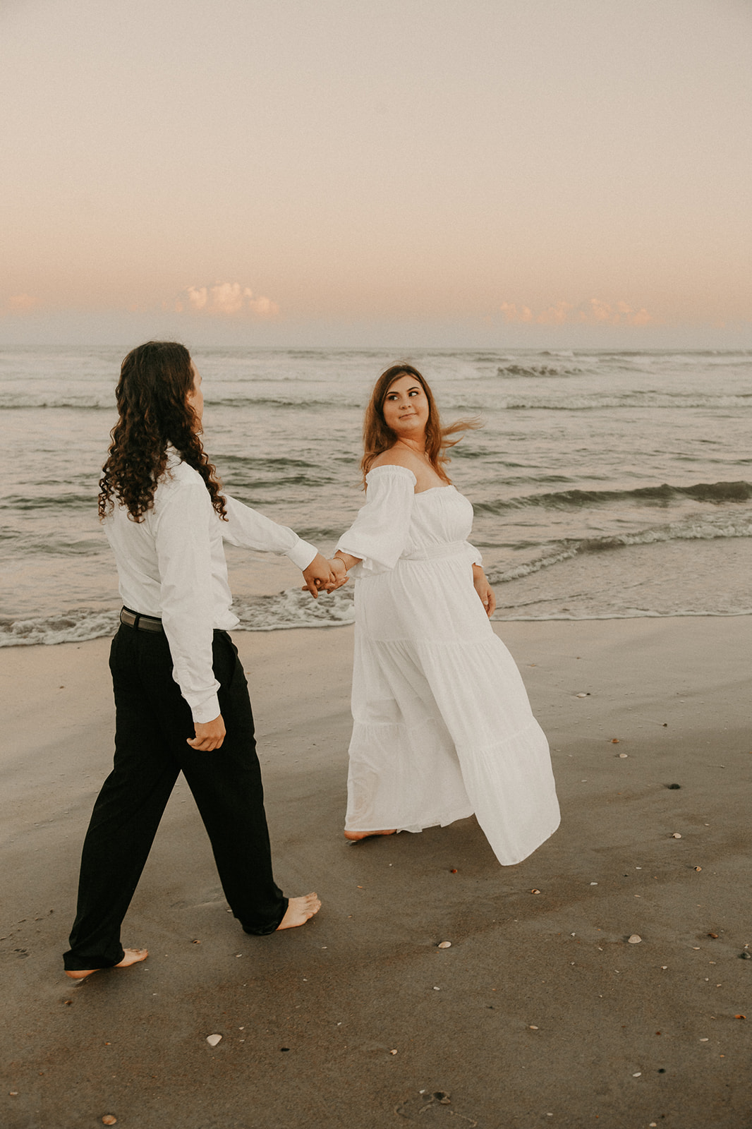 Marissa and Jeff celebrating their engagement on Ponta Vedra Beach during blue hour