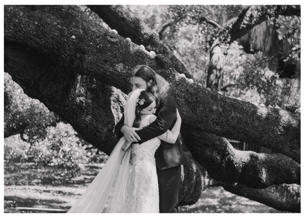 An emotional hug between a bride and groom after their elopement ceremony in Jacksonville Florida