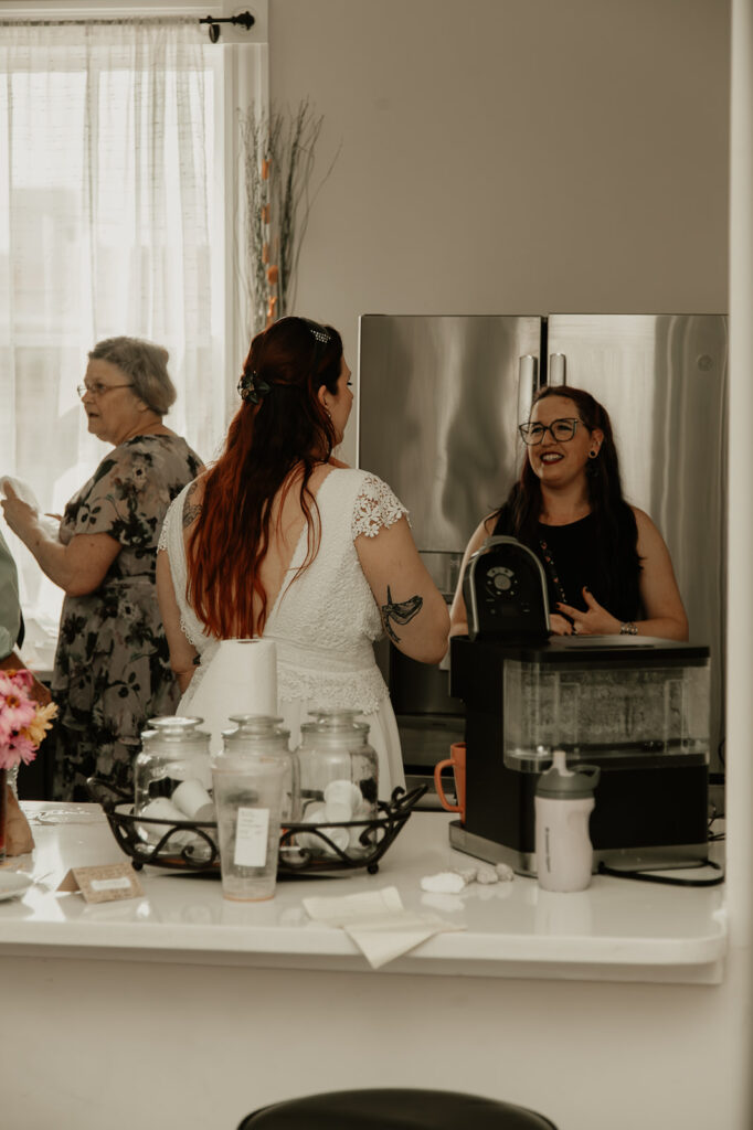 Bride talking to wedding guests