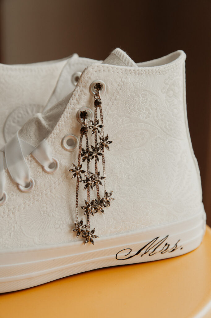 wedding earrings handing from wedding day converse