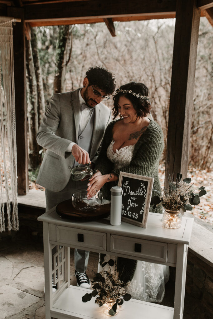 Danielle and Jon's hand washing ceremony at their Asheville North Carolina Elopement