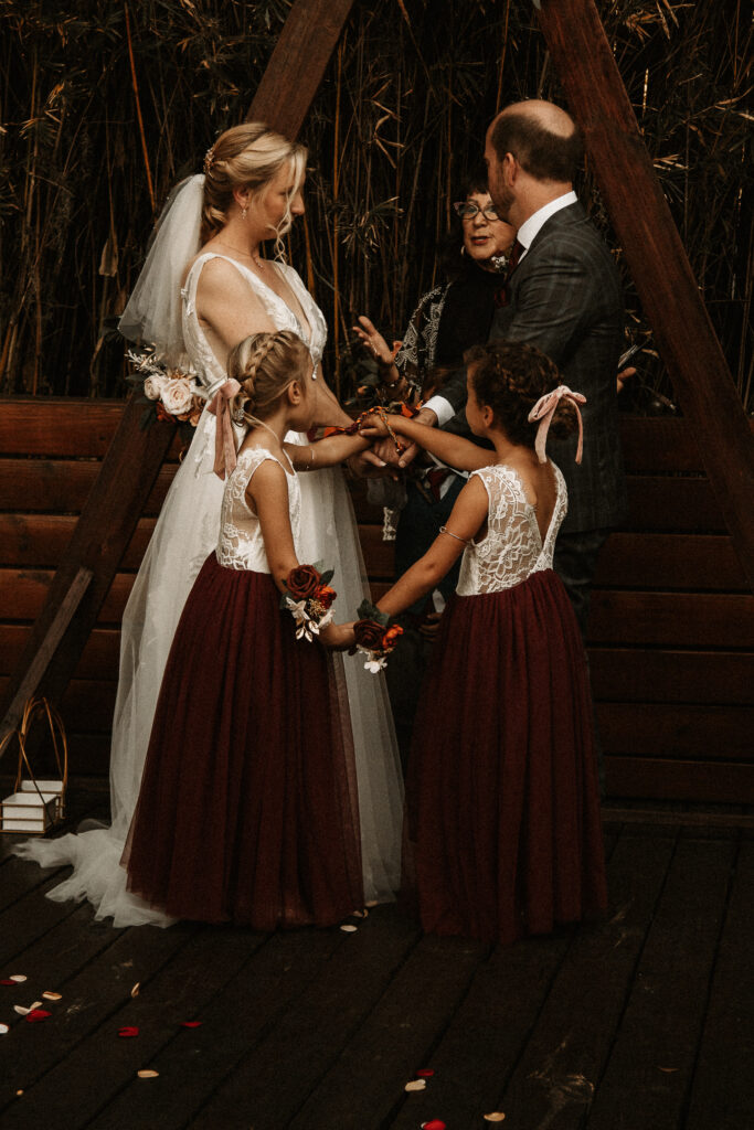 Blended family hand tying ceremony 