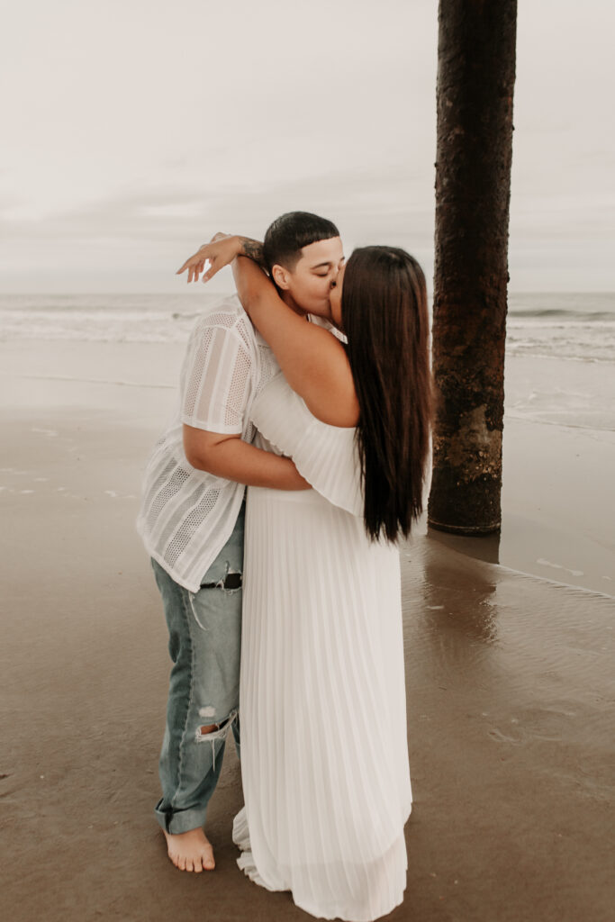 Brides Kissing under the pier in St. Augustine on their elopement day