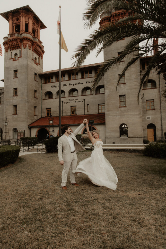 Groom spinning bride during St. Augustine Elopement