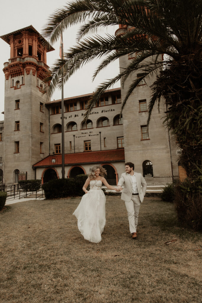 Bride and Groom running in from of the Lightner Museum