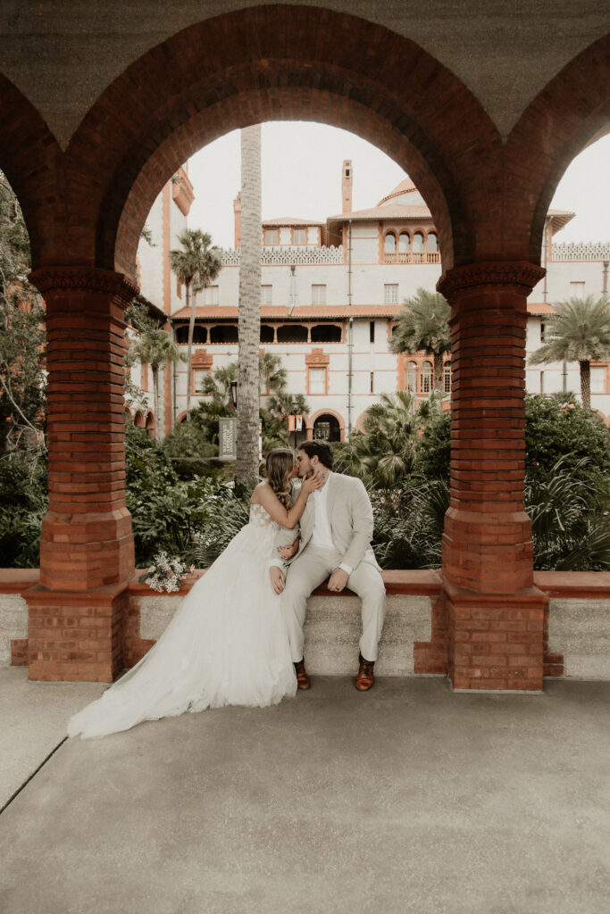 Bridge and Groom with Flagler College in the background